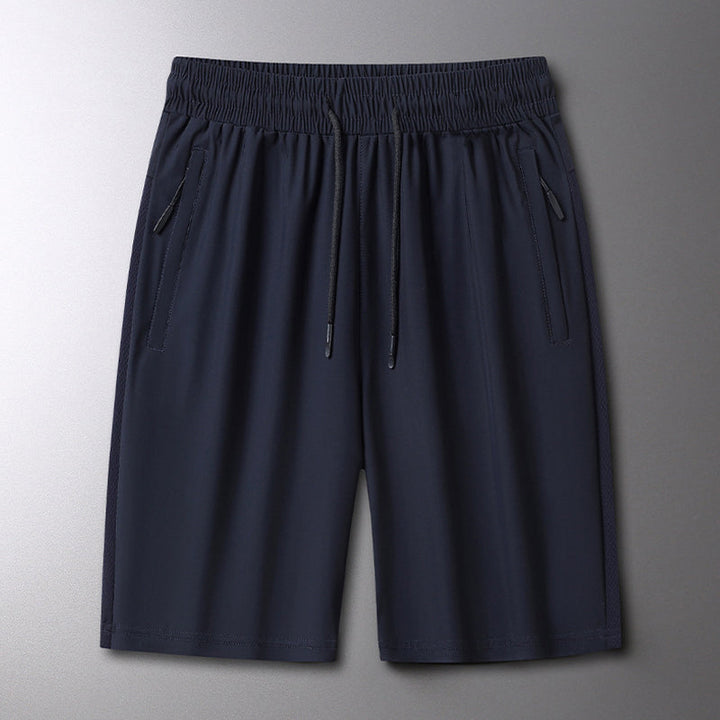 Aktive menns sportsshorts i elastisk stoff, designet for løping og sommeraktiviteter.