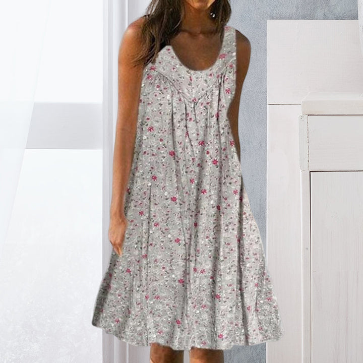 Grå blomstret damekjole, ermeløs tankkjole, løs passform, stilig sommer- eller vårkjole.