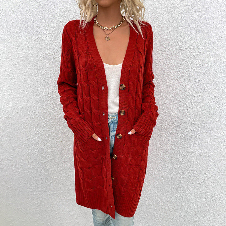 Myk og komfortabel lang cardigan i akryl for kvinner, med vakkert flettedesign og knappelukking. Perfekt høstgenser.