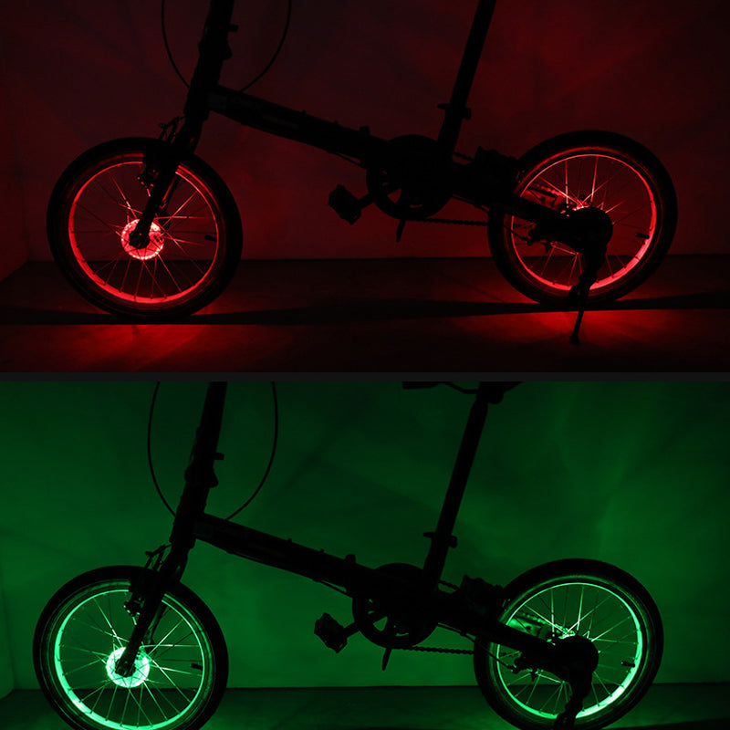 Sykkelutstyr: Unisex LED navlys, oppladbart for fargerik belysning og synlighet i trafikken.