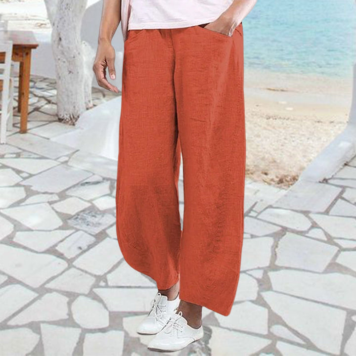 Kvinner komfortable mellomhøye bukser med vide ben, perfekt for avslappet hverdagsstil med lommer.