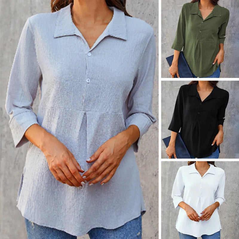 Stilren ensfarget damebluse. Balanserer elegant kontorstil med casual fritidsmote for kvinner.