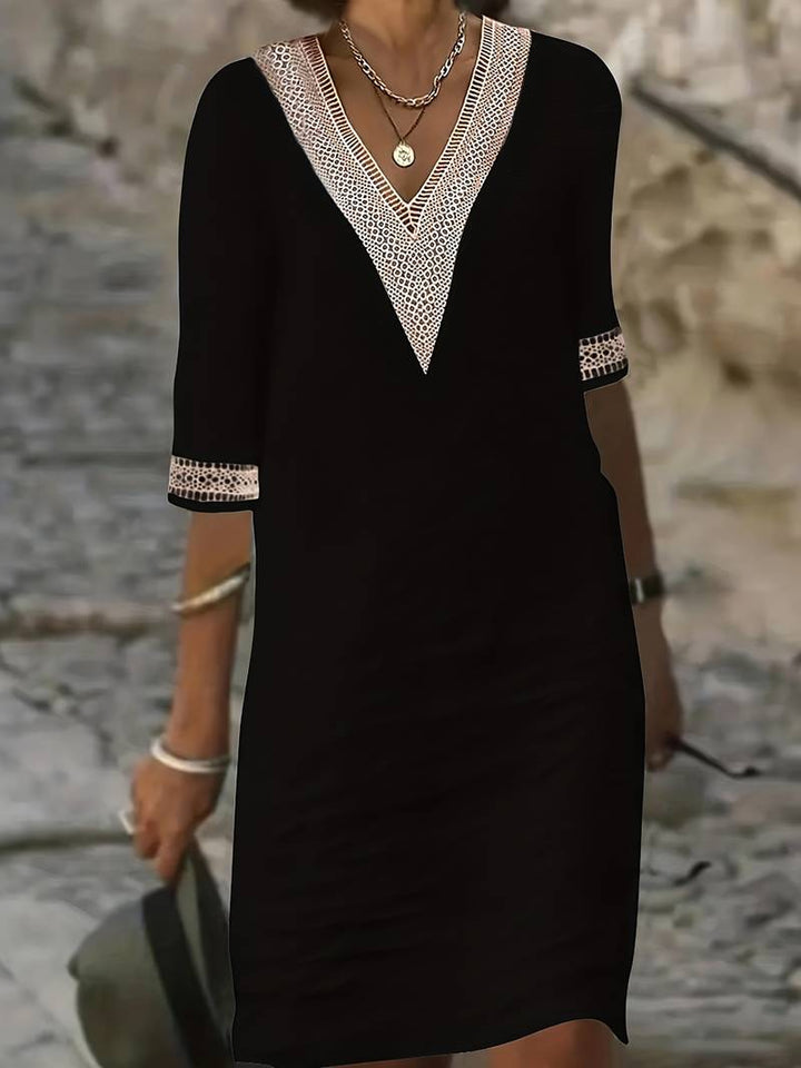 Elegant damekjole med guipureblonder for fest og formelle anledninger, klassisk tidløs stil.