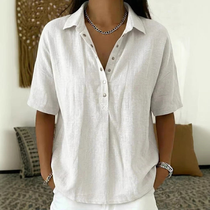 Stilig dame sommertopp, kortermet pullover med knapper. Allsidig og komfortabel for en avslappet sommer.