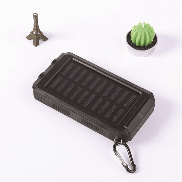 Kompakt design av solcellebatteri som passer i hånden, perfekt for reise og daglig bruk.
