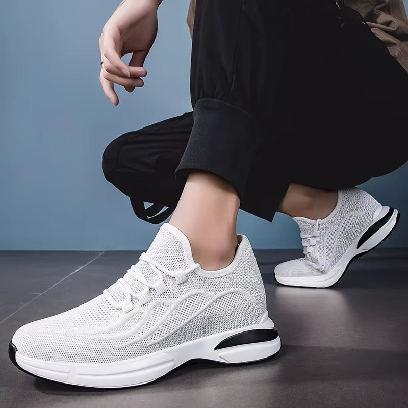 Moderne grå sneakers for herre, tilbyr 7 cm høydeøkning og utmerket komfort.