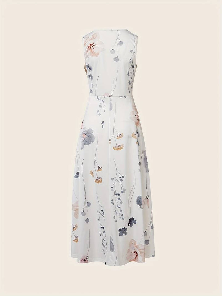 Elegant lang kjole for kvinner med vakkert blomstertrykk. Perfekt sommerkjole til fest og spesielle anledninger.