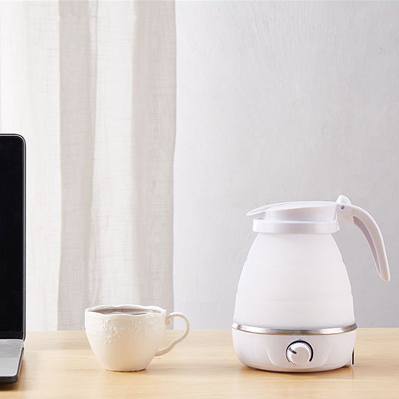 Vannkoker i silikon for te og kaffe, med temperaturinnstillinger for perfekt brygging på reise.