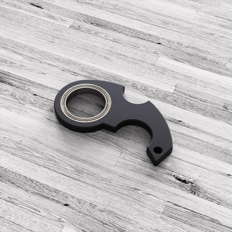 Fidget nøkkelring spinner som forbedrer konsentrasjon og fremmer ro.