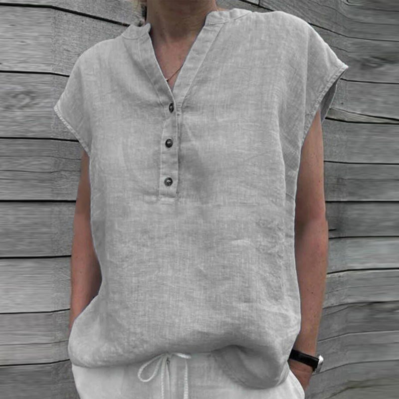 Allsidig kortermet t-skjorte for kvinner med elegant V-hals og knapper. Perfekt for vår og sommer.