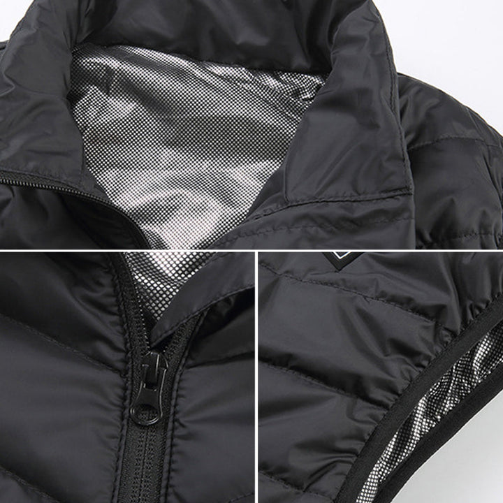 Oppvarmet vest i en dyp blåfarge, unisex modell for turklær og kalde dager. Oppladbar.
