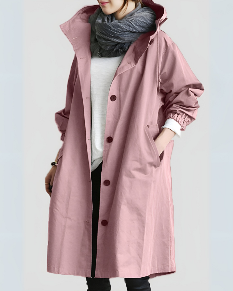 Moderne trenchcoat for kvinner med praktisk hette, et elegant yttertøy for hverdagsbruk.