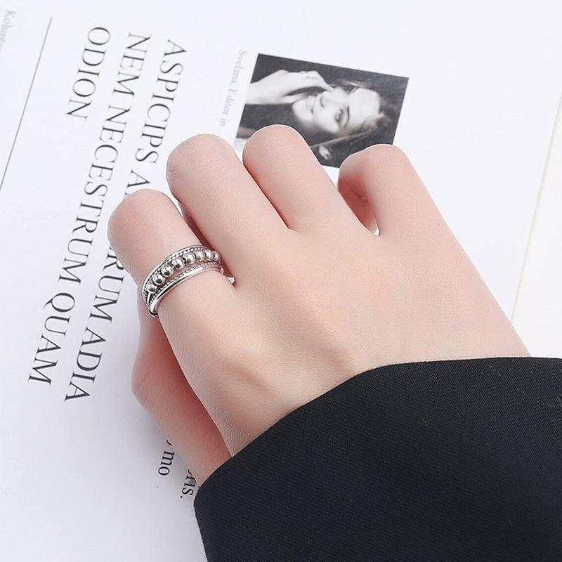 Rosegull fidget ring for konsentrasjon og ro, med unike roterende detaljer.