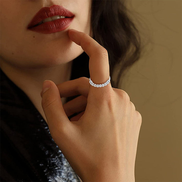 Elegant justerbar sølvring. En diskret fidget angstring designet for stresslindring og hverdagskomfort.