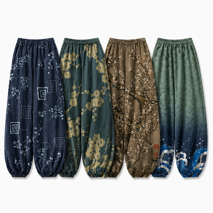 Flytende vide sommerbukser med levende japansk kunstdesign for damer, perfekt for et unikt strandantrekk.