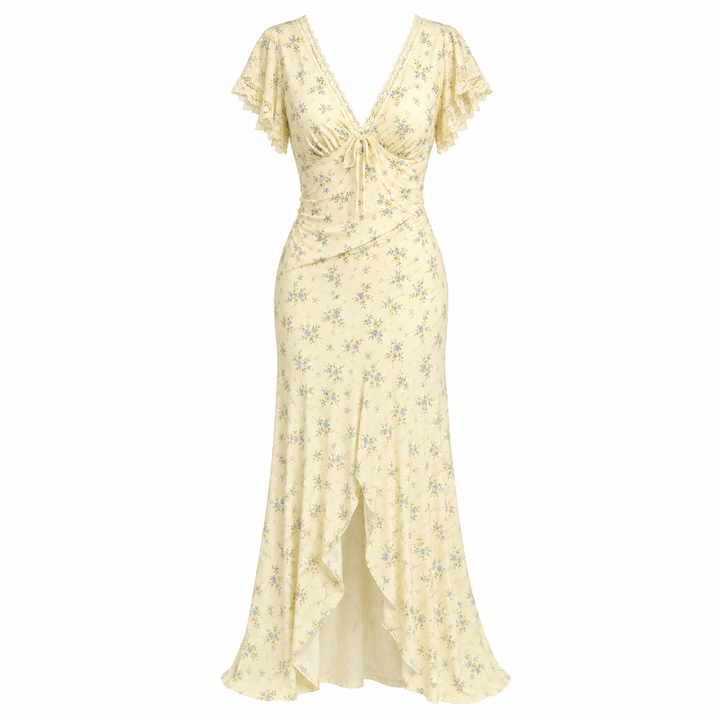Elegant mønstret sommerkjole for dame med V-hals, høy midje og side splitt. Perfekt lett feriekjole.