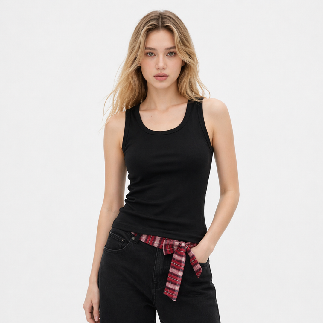 Dame singlet i enkel, stilren design, myk bomull og slim fit for en moderne hverdagslook.