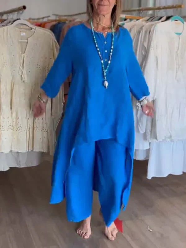 Elegant kvinnekostyme i lin, perfekt for komfortabel fritid og stilig sommer.