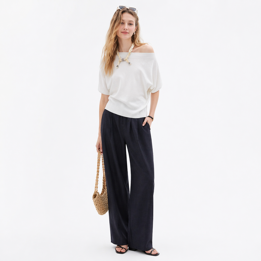 Komfortabel dame off-shoulder sommertopp med løs passform. Ideell for både hverdag og fest.