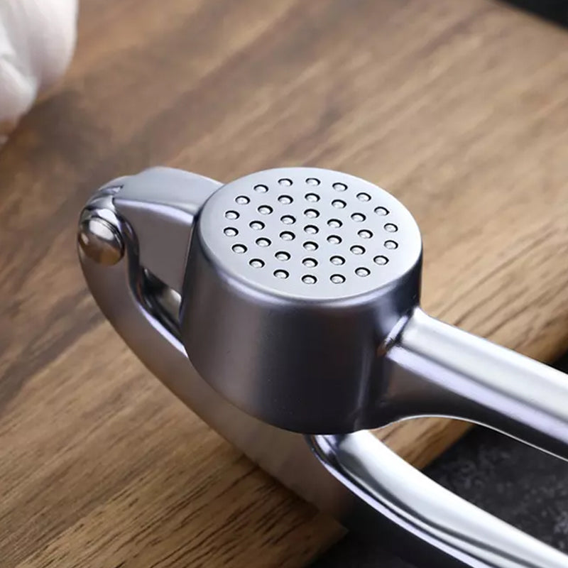 Effektiv hvitløkshakker for fersk eller tørket hvitløk; et must-have ergonomisk kjøkkenutstyr.