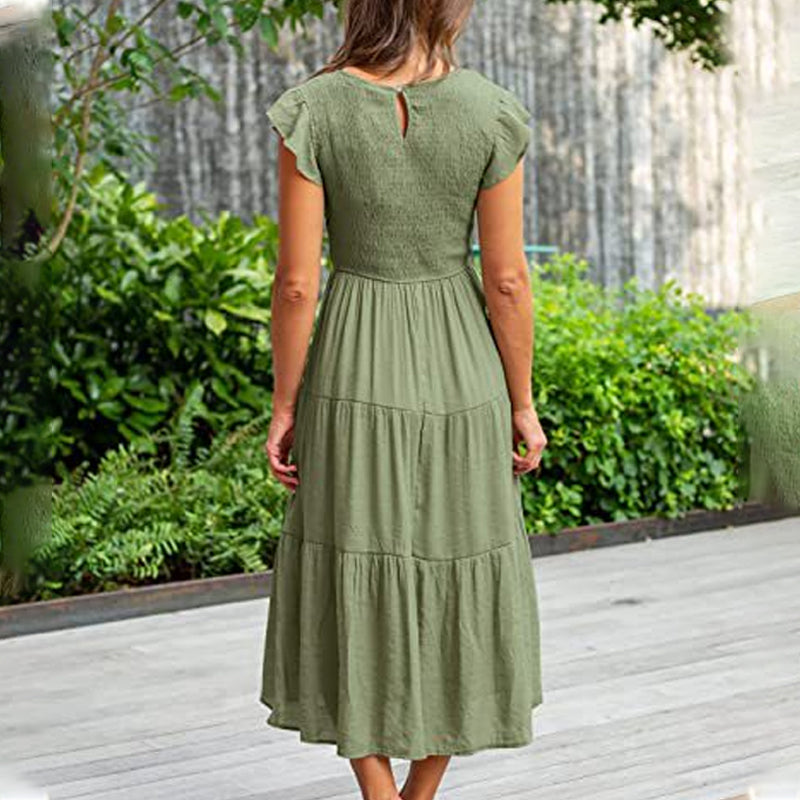 Ensfarget midi volangkjole for dame. Pustende sommerkjole i bomullsblanding, perfekt og elegant.