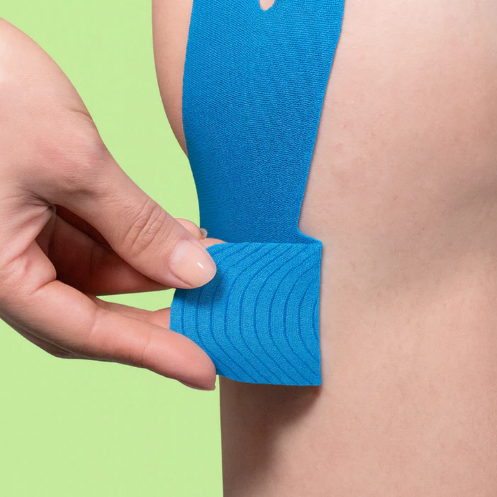 Komfortabelt unisex kneplaster som tilbyr stabil støtte og lindring av knesmerter under trening.