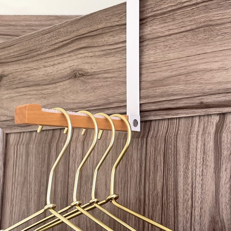 Produktbilde av sammenleggbare dørkroker i tre. Enkel installasjon for smart og plassbesparende organisering hjemme.