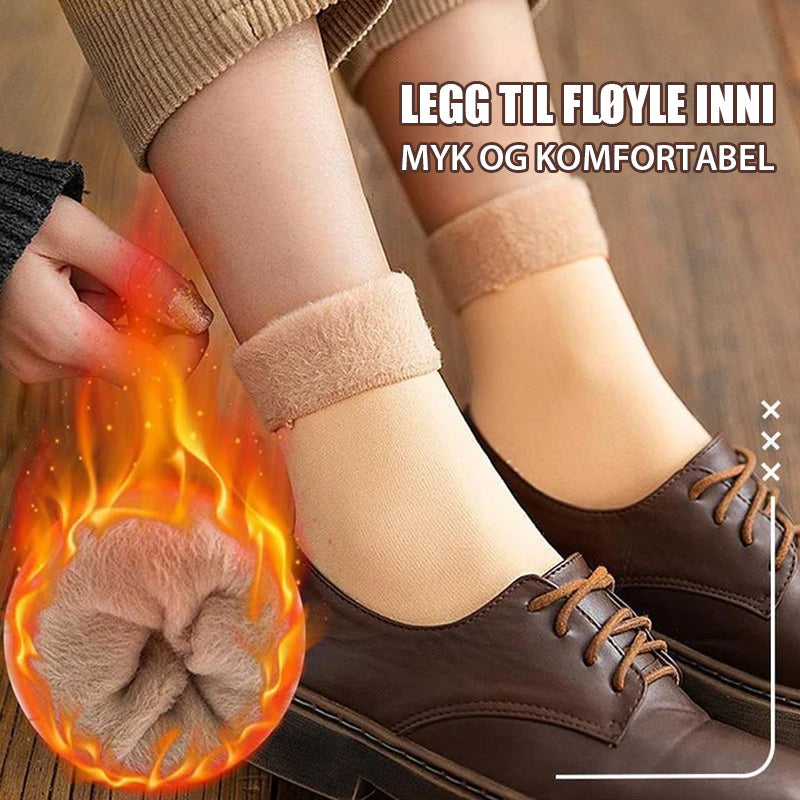 Supermyke og varme damesokker, perfekte for innekos på kalde dager. Fluffy kvalitet.