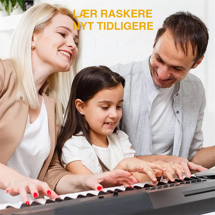 Pakke med avtakbare klaviaturnoter, klar til bruk for effektiv og morsom undervisning i piano.