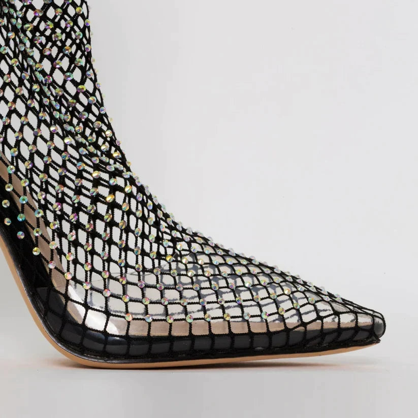 Glitrende dame nettingstøvler med rhinestones og stiletthæl, ideelle for en iøynefallende festantrekk.