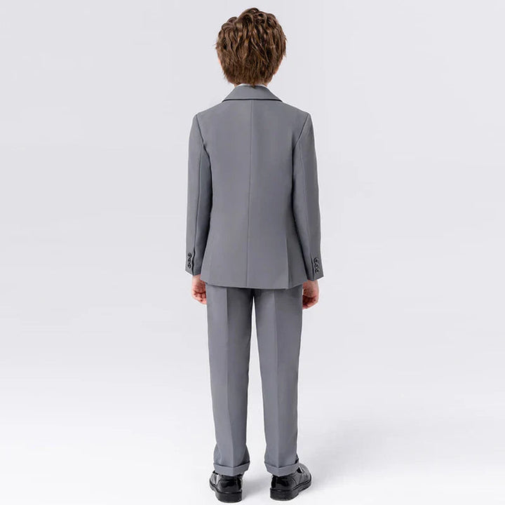 Barnesmoking sett: formell blazer, bukse og slips for gutter, ideelt til bryllup, konfirmasjon og selskap.