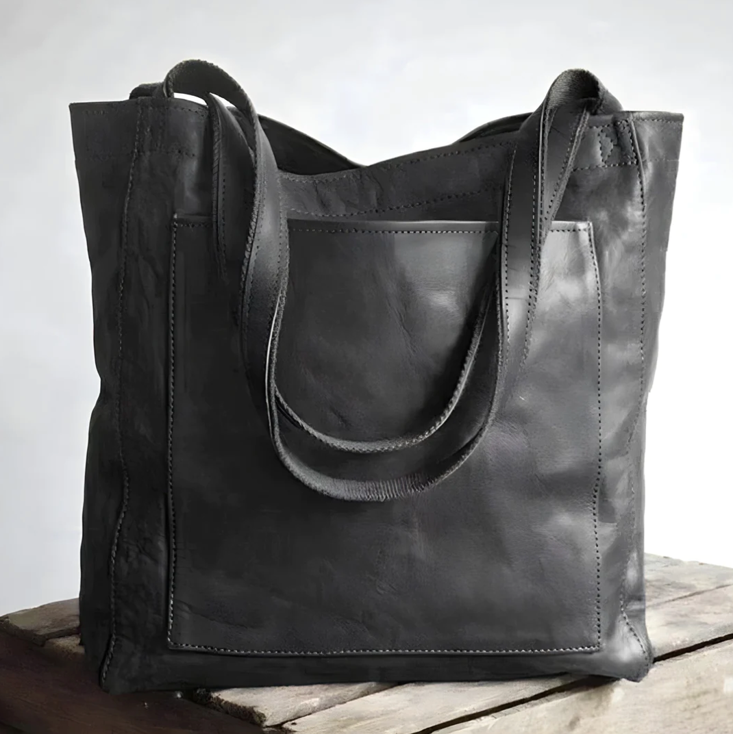 Stilren elegant damehåndveske. En tidløs moteveske for kvinner, perfekt som skulderveske til kontor og hverdag.