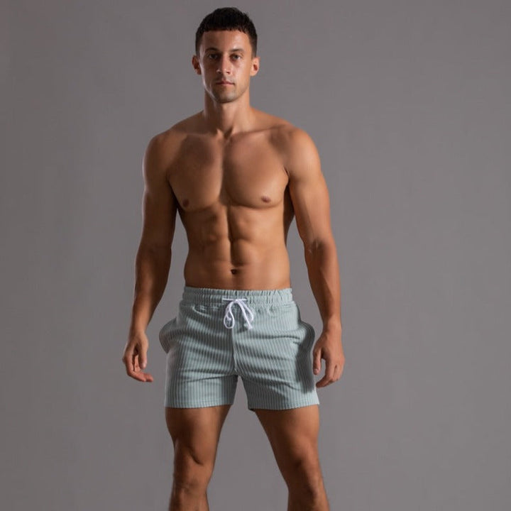 Røde herre reiseshorts med elastisk midje, ideelle for aktiv ferie og solfylte dager.