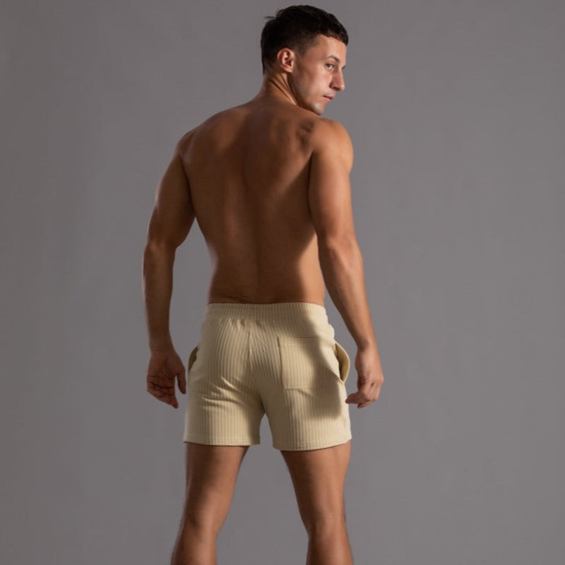 Marineblå herre strandshorts, slimfit passform, moderne og klar for sommeren.