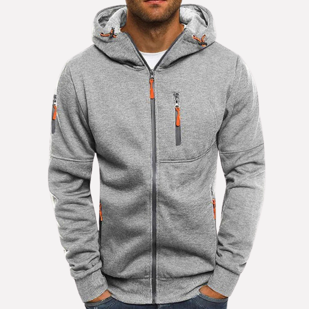 Uformell unisex glidelåshettegenser. Ytterplagg for både dame og herre, perfekt for aktiv fritid.