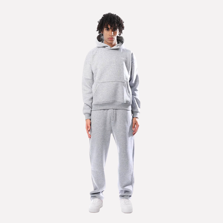 Stilfull unisex treningsdrakt i nøytral farge. Et komfortabelt og matchende sett for sport og avslapning.