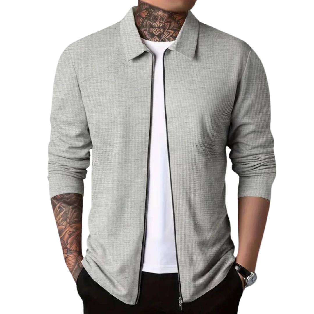 Herrecardigan i slank passform. Moderne, stilfull design perfekt for casual og smart casual antrekk.