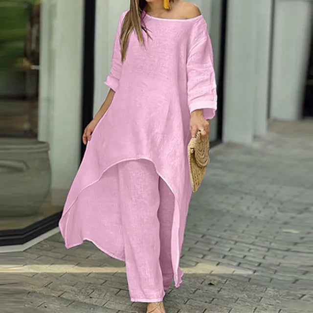 Trendy vår/sommer linsett for kvinner. Komfortabelt og løst med off-shoulder topp og vide bukser.