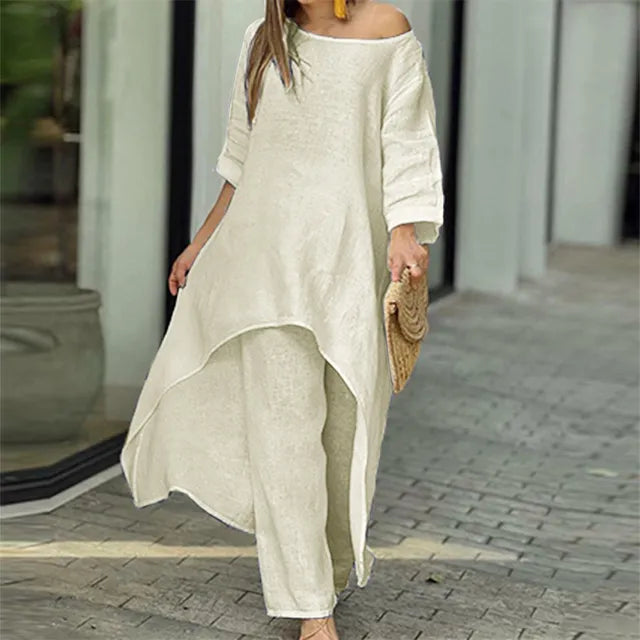 Pustende bomull-lin sett for kvinner. Løs passform med trendy off-shoulder topp og vide ben.
