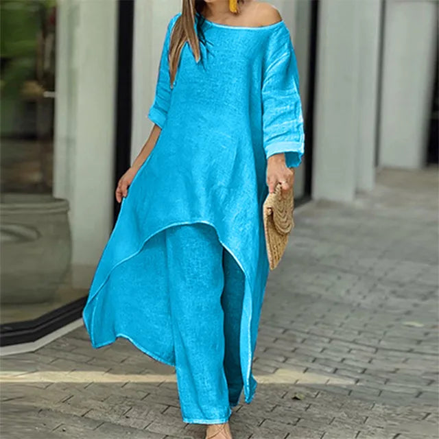 Kvinnelig linsett i løs passform: off-shoulder topp og vide bukser for en avslappet sommerstil.