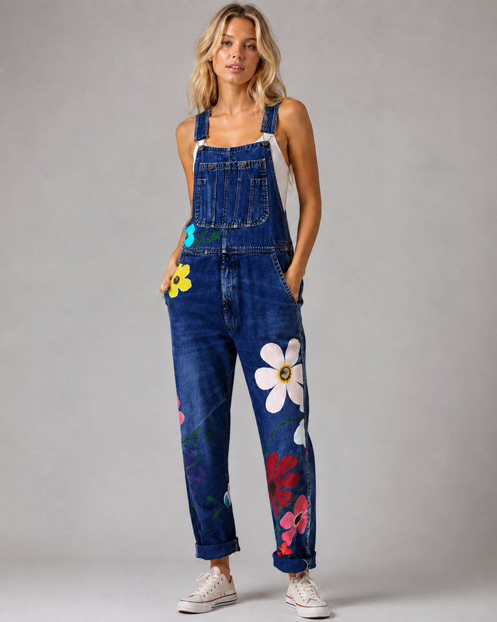 Mørk blå vintage stil jumpsuit for kvinner, komfortabel med lekne blomsterdetaljer. Ideell for fritidsantrekk.