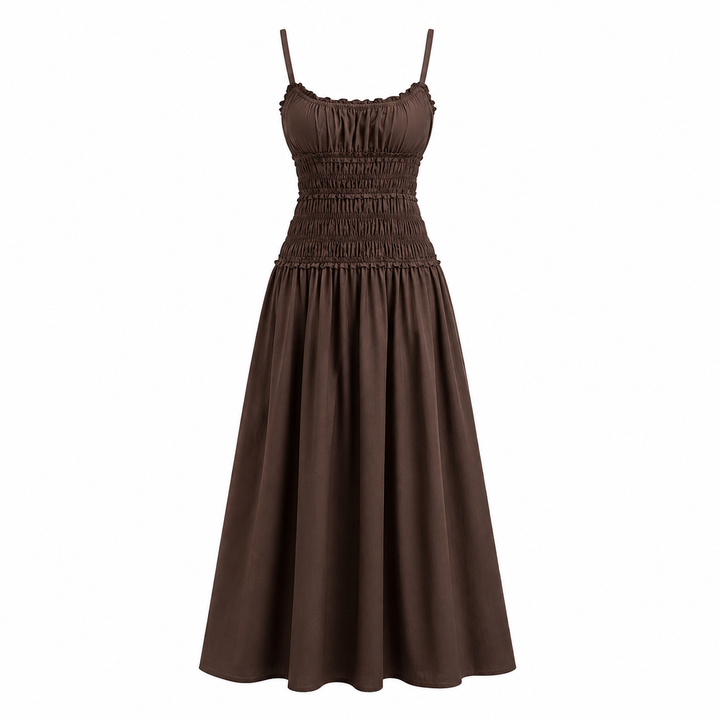 Elegant hvit bomullskjole med drapering og spagettistropper. Perfekt som sommerkjole eller feriekjole for dame.
