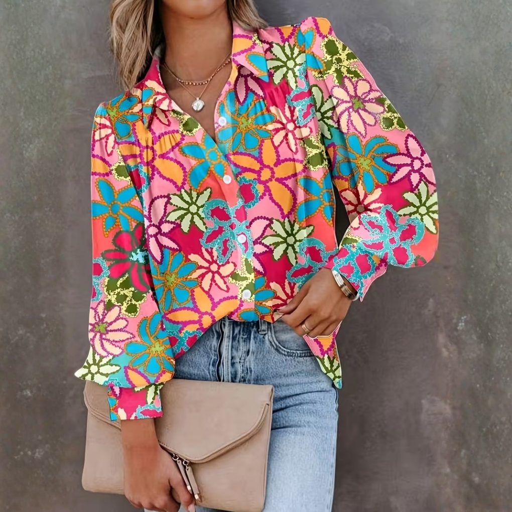 Elegant flerfarget blomstret dameskjorte med knapper. Langermet casual topp, perfekt for hverdag.