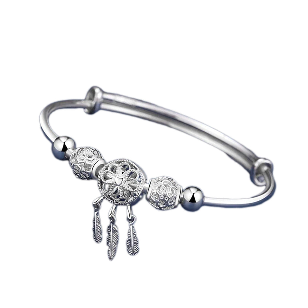 Elegant drømmefanger armbånd i glinsende sterlingsølv for kvinner.