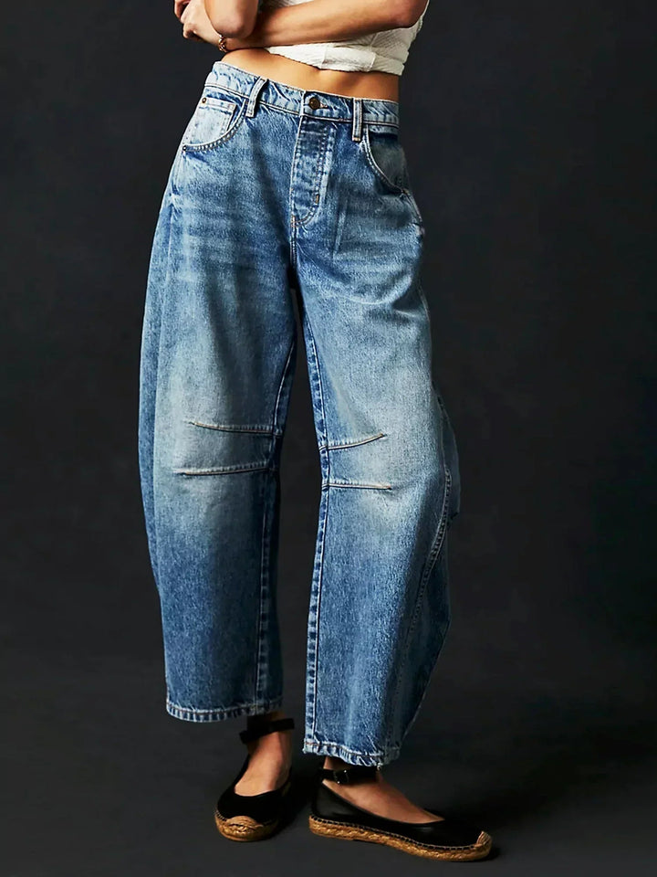 Damebukse: Komfortable Barrel Jeans med vide ben og avslappet passform, ideell for bevegelse og moderne stil.