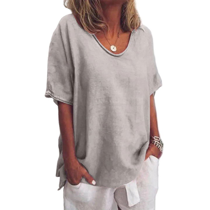 Dame langermet løs bluse med V-hals i behagelig stoff for hverdag og elegant stil.