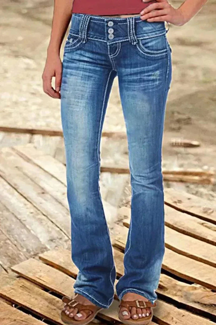 Blå ripped dame bootcut jeans med høy midje, designet for en moteriktig og avslappet hverdagsstil.