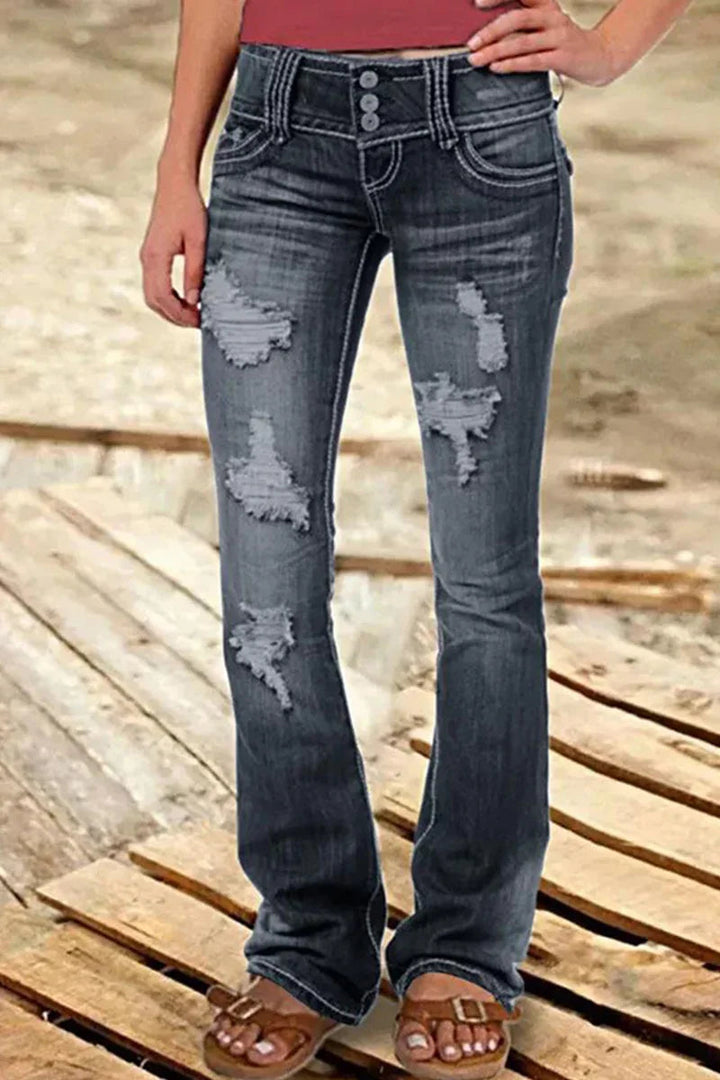 Trendy bootcut jeans for kvinner med høy midje og utvidet ben, ideell for et moderne fritidsantrekk.