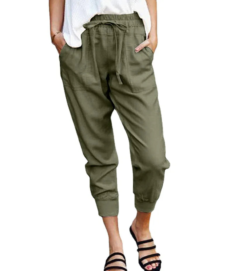 Elegante casual damebukser med høyt liv og snøring. Perfekte hverdagsbukser for en avslappet, men stilig look.