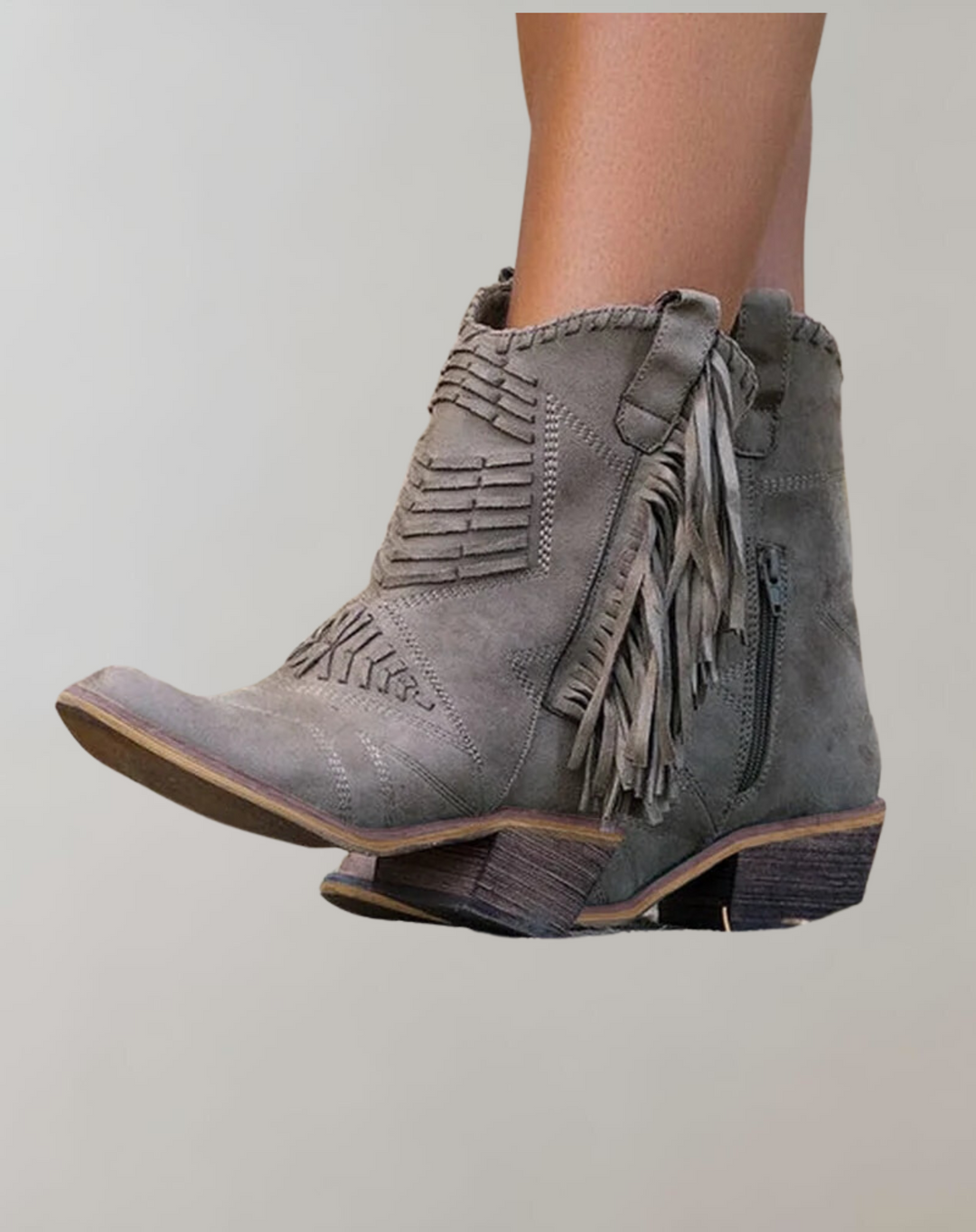 Trendy frynsestøvler for damer, med autentisk cowgirl-utseende og robust såle, ideelle for hverdagsbruk.
